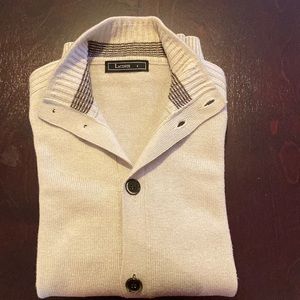 Lacoste button down cardigan, cream coloured.  Designed in France.